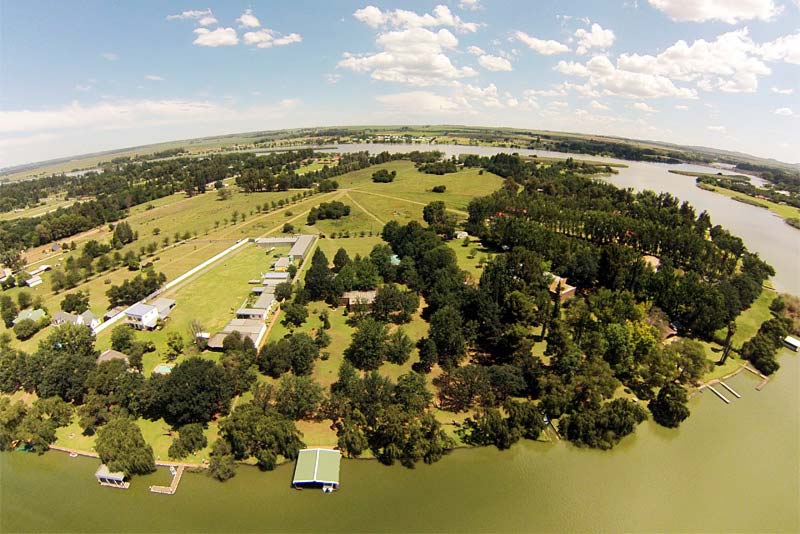Aerial View of property. The Green Boat house is on the property