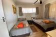 Second room with 2 single beds