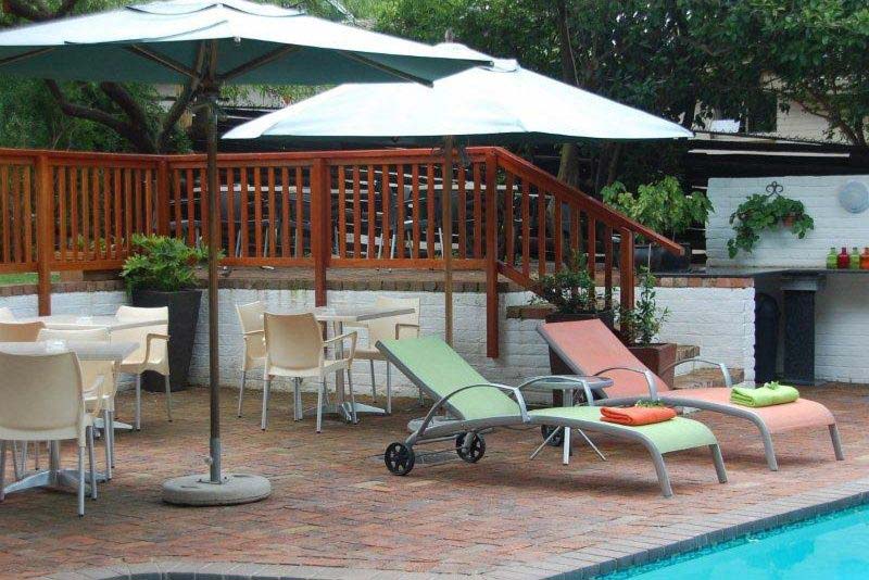 Pool with sun loungers