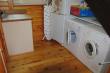 down stairs washing machine, tumble drier plus an extra fridge