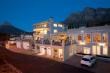 3 on Camps Bay at night