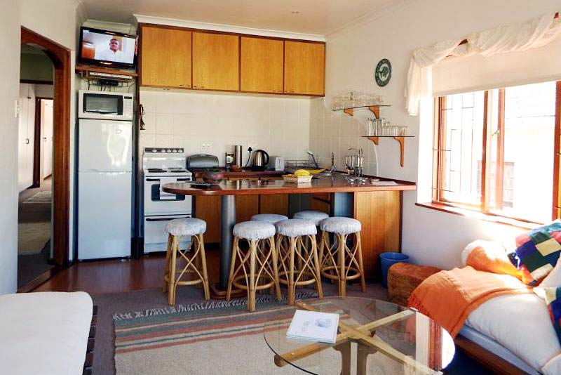 UPSTAIRS open-plan lounge-dining-kitchen