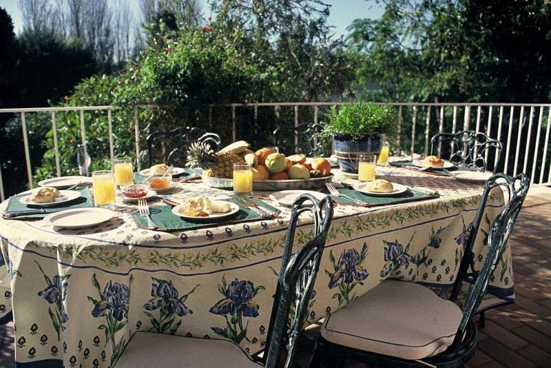 Breakfast on the patio of the Guest House