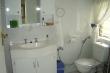 Green Suite Bathroom with Bath + Shower