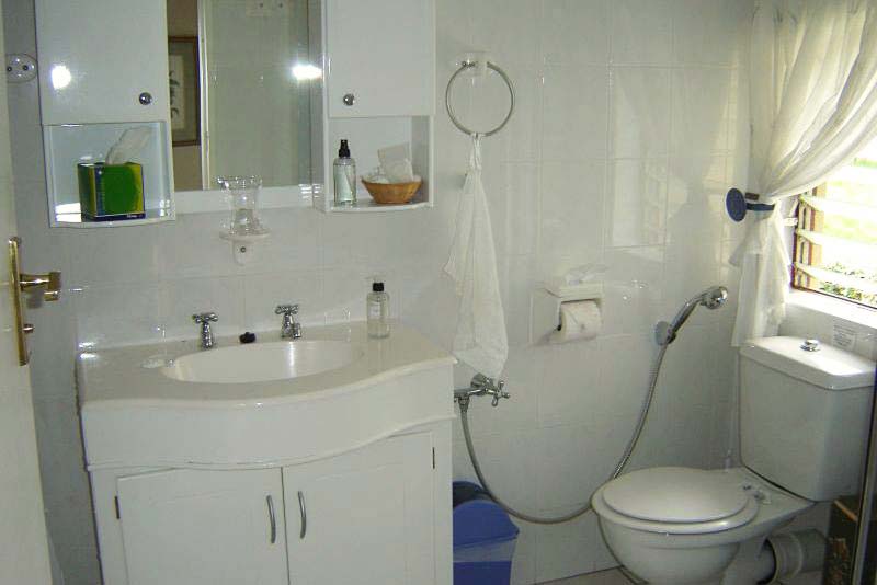 Green Suite Bathroom with Bath + Shower