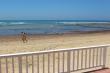Step onto the beach from the deck