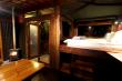 Fly Me to The Moon Forest Cabin by night