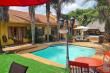 Patio overlooking the pool