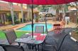 Patio overlooking the inviting pool!