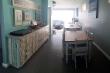 View from kitchen through dining area to the sea