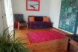 TV room with flat screen TV and open view channels. Bring your own decoder for more channels. 