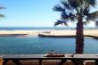 View on water-feature, sea and beach from the deck