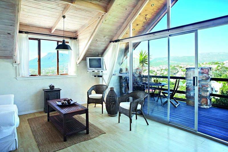 Loft Suite - open plan living area and deck with a view