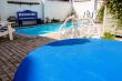 The Thatch apartment braai area at the pool