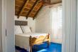 The Thatch apartment upstairs bedroom with bit of view