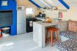 The Top loft apartment kithen with inside fireplace/braai