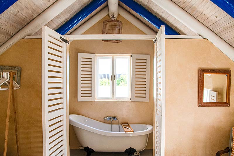 The Top loft apartment bedroom to bathroom