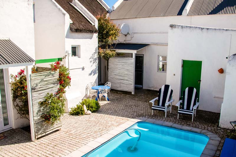 Swimming pool for all guests at Opstal to share