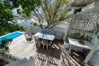 Seating area at the pool and braai