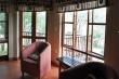 Main on - suite bedroom with dressing room and access to game viewing deck