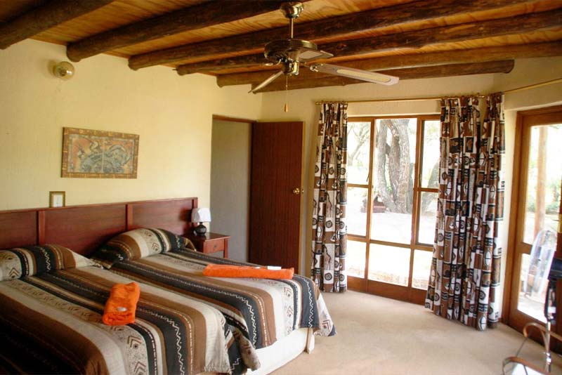 Double guest bed on - suite bedroom with own entrance to lodge