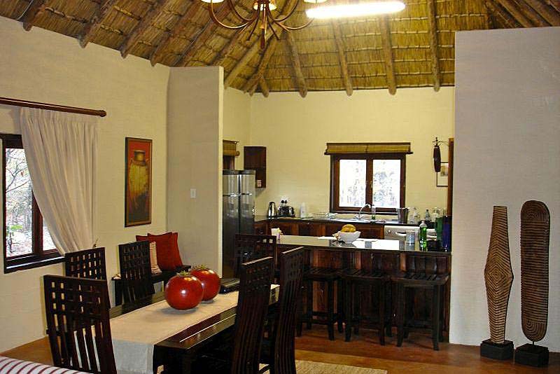 Dining area through to kitchen