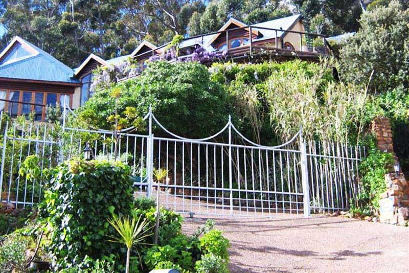 Nestled against the forest overlooking dramatic seaviews