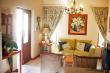 sitting room with fireplace and air conditioning