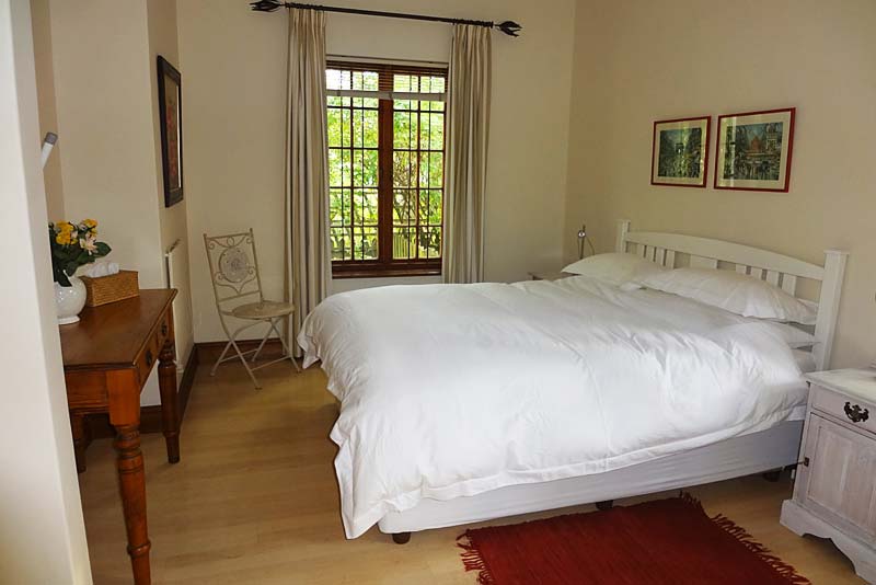 Wisteria - main bedroom with queen-size bed.