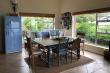 Upstairs dining area and single bed