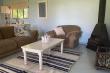 Cottage 1 - Lounge/dining room with fireplace