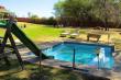 Enjoy the pool in this tranquil setting