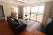 Living room with fireplace and aircon