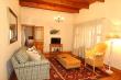 TV lounge with french doors to stoep with braai.