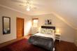 Upstairs private bedroom with en-suite bathroom.
