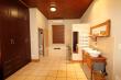 Main bedroom en-suite bathroom. It is open plan with the bedroom. Only the toilet is separate.
