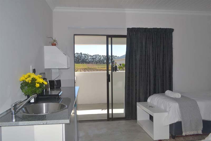 Each room has its own kitchenette with induction stove, fridge, micro wave and basic cutlery etc
