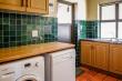 Scullery, double washing basins, dishwasher, washing machine & tumble drier