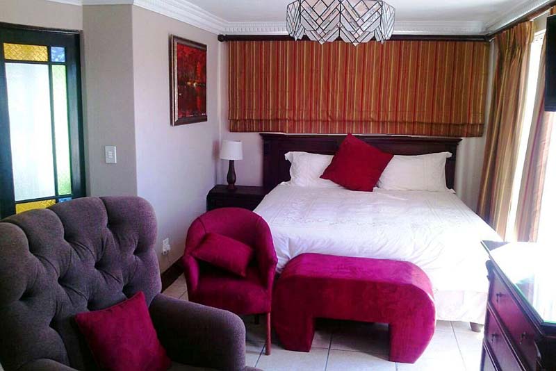 Relax in our large stylish Deluxe room