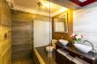 Bathroom features an exclusive large double-shower.