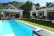 Beautiful overview of Villa with the pool and poolhouse. 