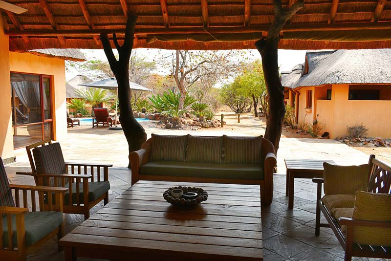 large covered patio leading from the lounge area