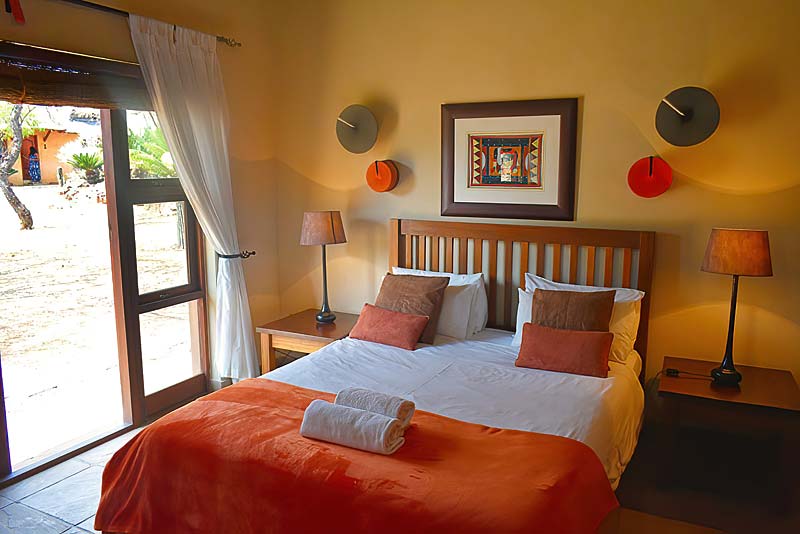 one of the bedrooms with queen bed