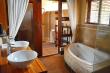bathroom leading out to the outside shower