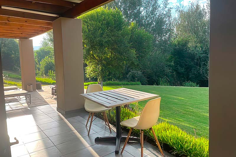 Patio view with a big garden