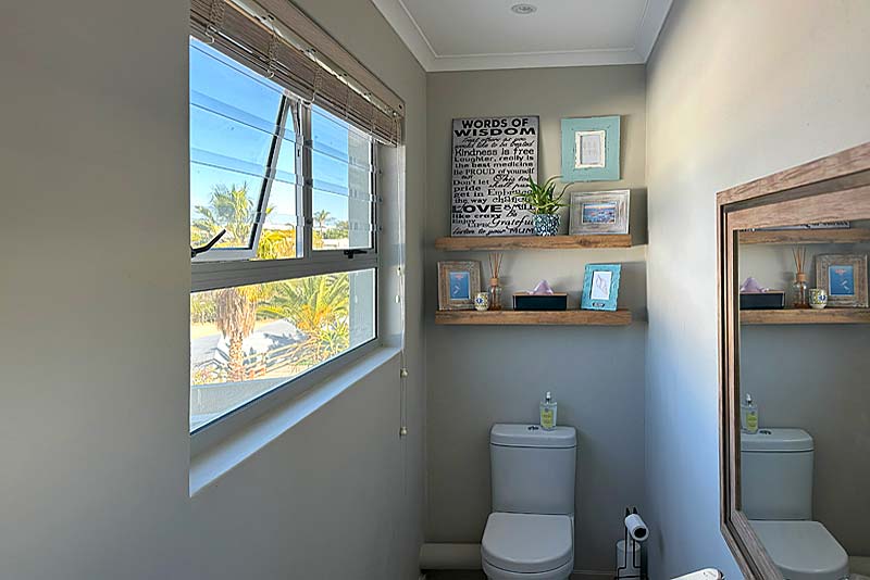 Guest toilet with blinds open
