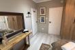 Doors to living room (L) and en-suite (R)