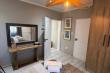 Doors to living room (L) and en-suite (R)