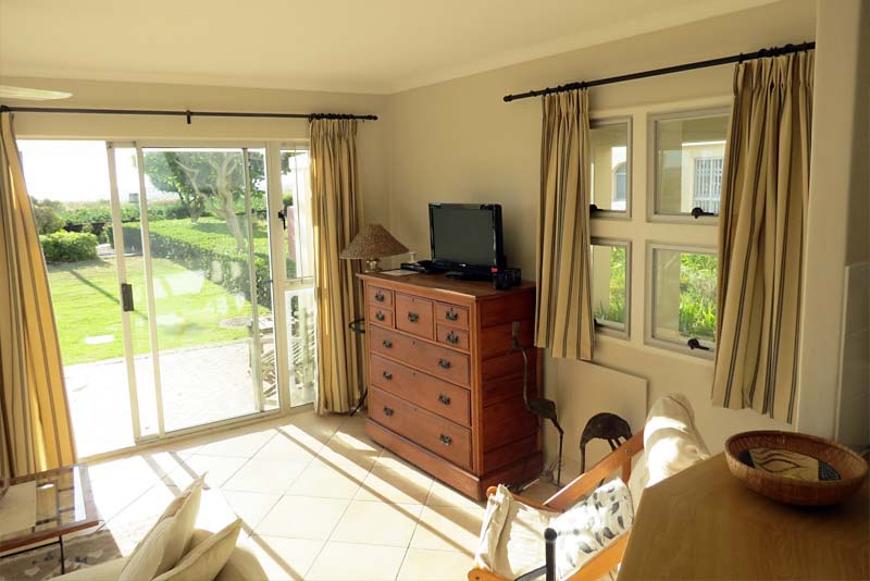 Sitting area with TV - Tamarind Beach House self catering Strand