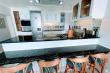 Pearl granite breakfast bar and kitchen